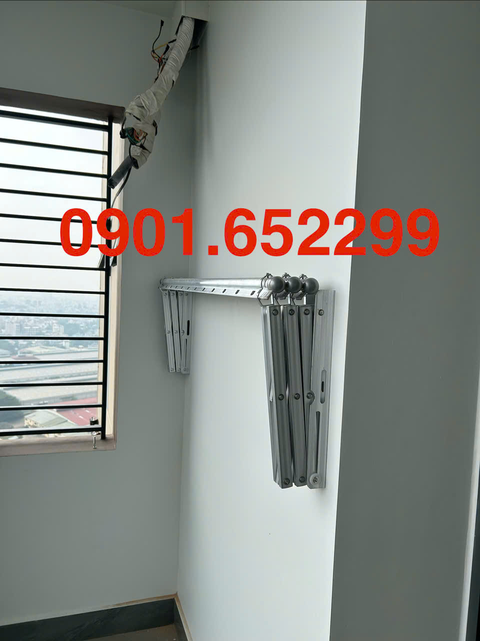 Thi công ,lắp đặt giàn phơi gắn tường tại Vĩnh Cửu